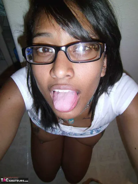 Ebony Brunette Shows Her Big Tattooed Tits and Shaved Pussy – photo 14 of 16