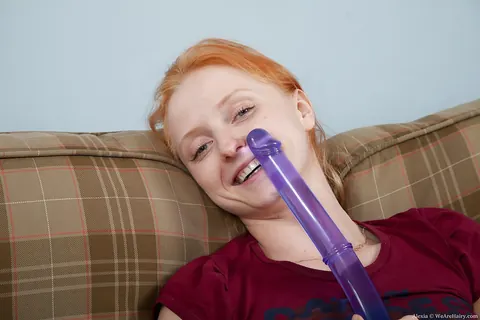 Redhead in a Skirt Fingers Her Hairy Pussy and Rides a Dildo – photo 3 of 16