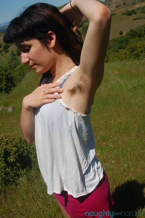 Slim Hairy Brunette Undresses and Poses Outdoors – photo 8 of 21