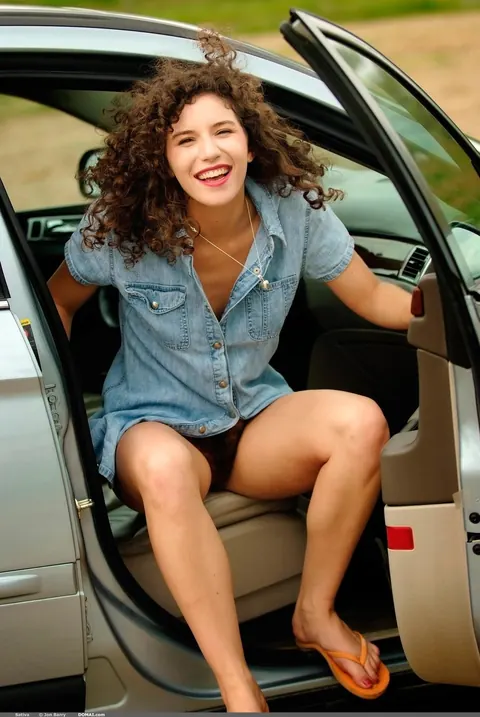 Busty Curly-Haired Babe Strips Out of Her Skirt Outdoors – photo 3 of 21