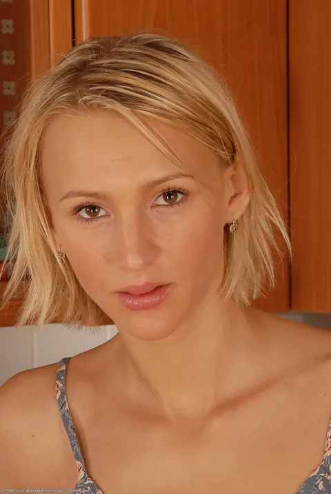 Short-Haired Blonde Undresses and Poses Nude in the Kitchen – photo 2 of 20