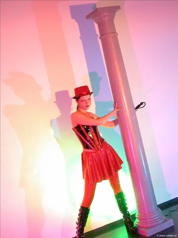 Woman in Latex Costume Shows Her Pussy in High Heels