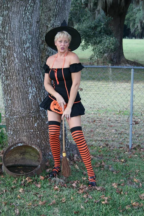 Tracy Lick: Tall Blonde MILF Uses a Dildo Outdoors in Stockings for Halloween – photo 4 of 20