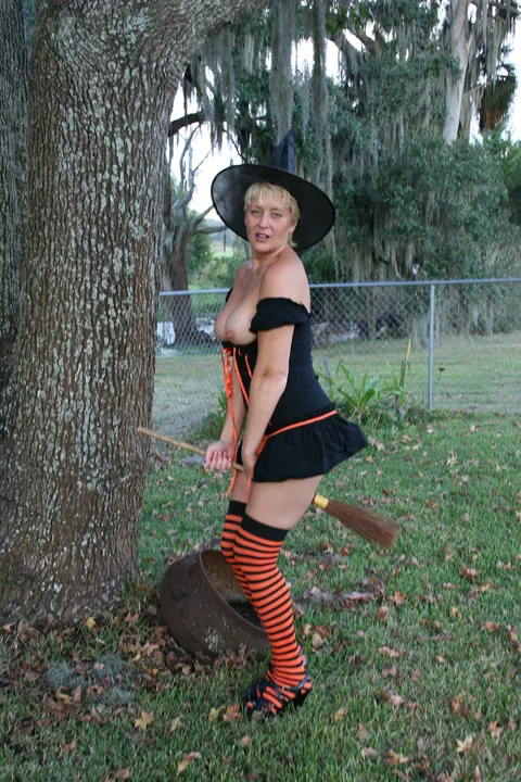 Tracy Lick: Tall Blonde MILF Uses a Dildo Outdoors in Stockings for Halloween – photo 10 of 20