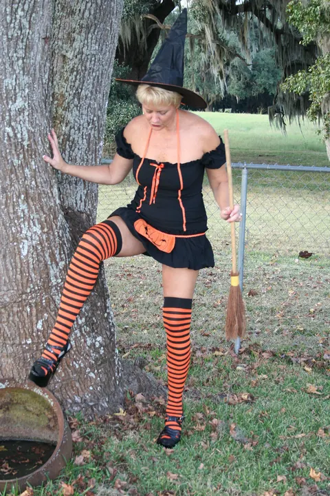 Tracy Lick: Tall Blonde MILF Uses a Dildo Outdoors in Stockings for Halloween – photo 1 of 20