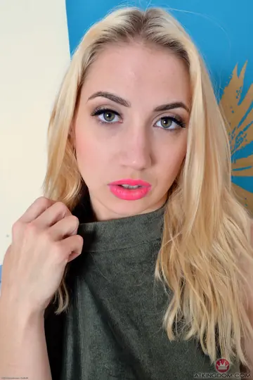Blonde with Natural Tits Spreads Her Trimmed Pussy in Close-Up