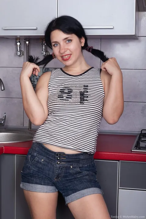Thick Brunette Maid Reveals Her Hairy Pussy in the Kitchen – photo 4 of 21