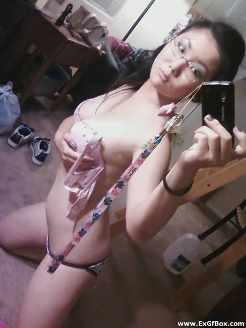 Short-Haired Asian Babe with Big Tits Spreads in Front of a Mirror – photo 11 of 20