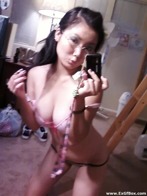 Short-Haired Asian Babe with Big Tits Spreads in Front of a Mirror – photo 10 of 20