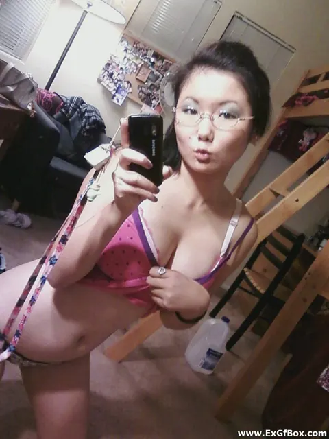 Short-Haired Asian Babe with Big Tits Spreads in Front of a Mirror – photo 9 of 20