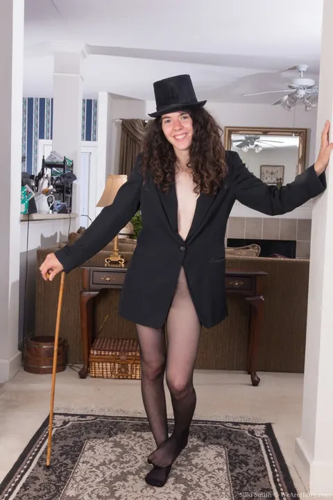 Silki Smith: Slim Brunette Strips Off Her Pantyhose to Show Her Hairy Pussy – photo 1 of 21