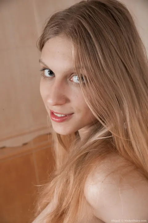 Blonde with Big Natural Tits Strips and Spreads Her Hairy Pussy – photo 16 of 16