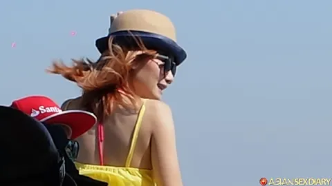 Frankfurter Titten: Petite Redhead PAWG Poses in a Yellow Top and Denim Shorts Outdoors – photo 7 of 20