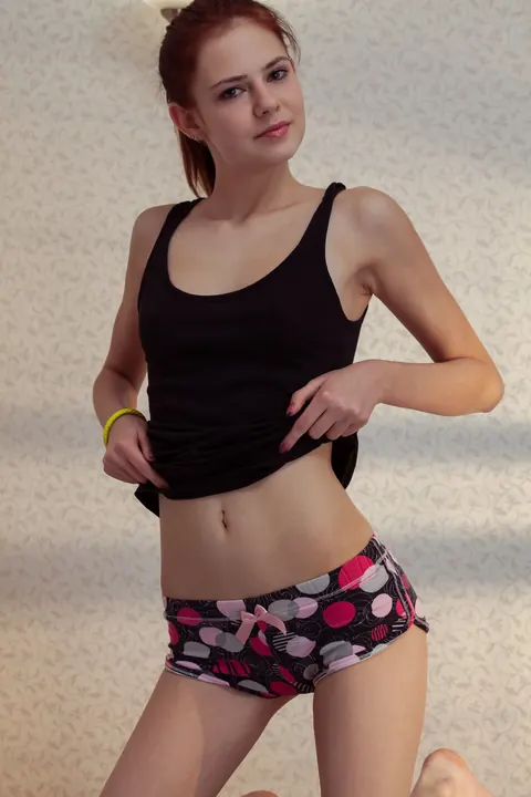 Juliett Lea: Slim Ukrainian Redhead Strips Off Her Shorts and Spreads Her Legs – photo 4 of 21
