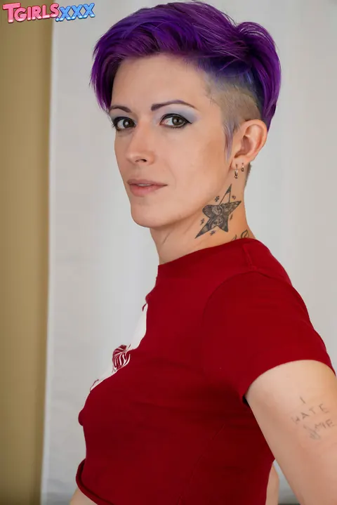 Trans Woman Strips Nude and Poses Front and Back Showing Her Figure – photo 2 of 16