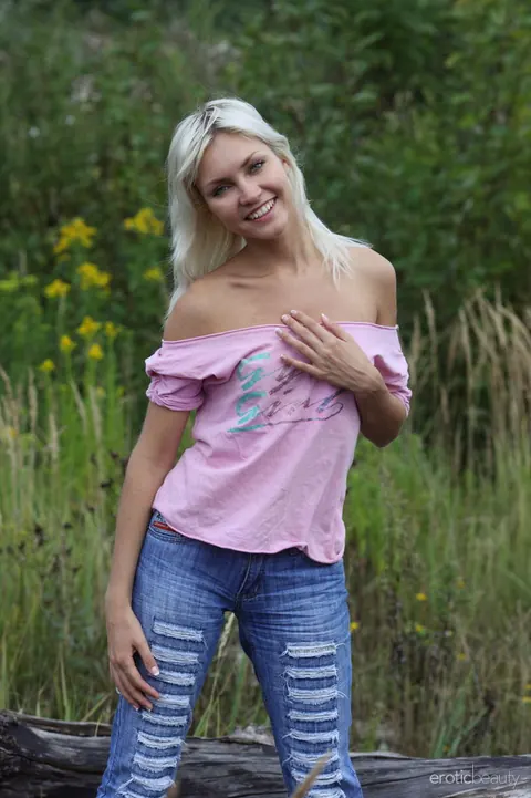 European Blonde Bares Her Small Tits and Ass in Jeans Outdoors – photo 4 of 16