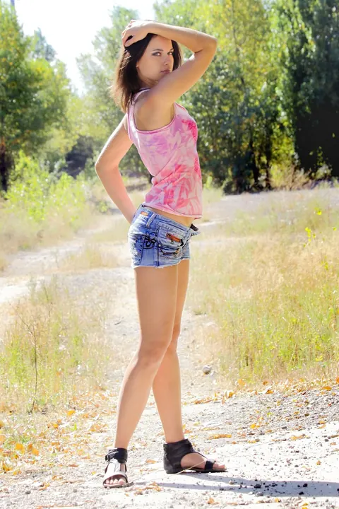 Woman in Shorts Strips Outdoors Showing Her Hairy Bush – photo 1 of 21