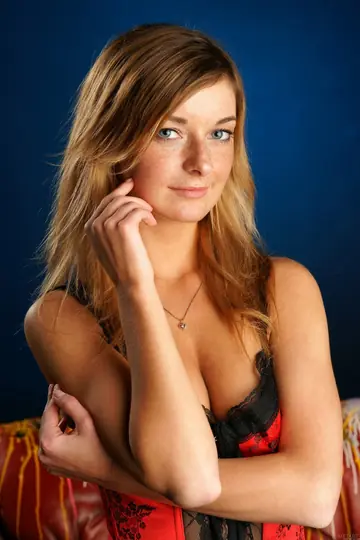 Slim Tanned Blonde Undresses Out of Her Lingerie and Stockings
