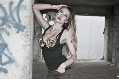 Annia Miller: European Blonde with Big Tits Poses Outdoors in Tight Jeans – photo 13 of 15
