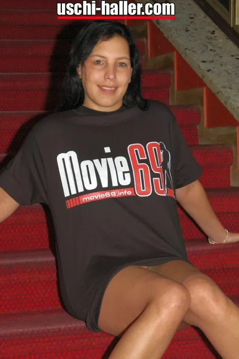 German MILF Flashes Her Legs in a Cinema – photo 10 of 16