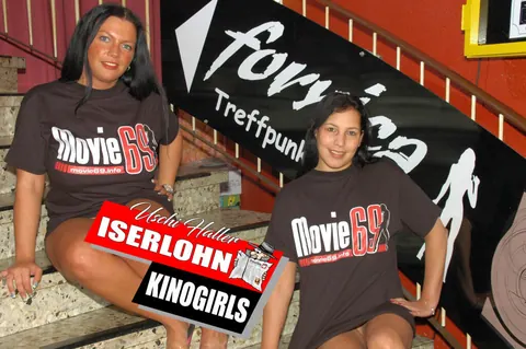 German MILF Flashes Her Legs in a Cinema – photo 1 of 16