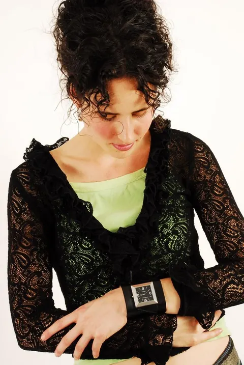 Brunette Woman Poses with Hair Up Wearing a Watch – photo 9 of 16