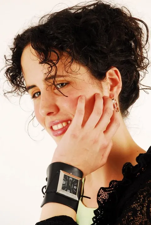 Brunette Woman Poses with Hair Up Wearing a Watch – photo 2 of 16