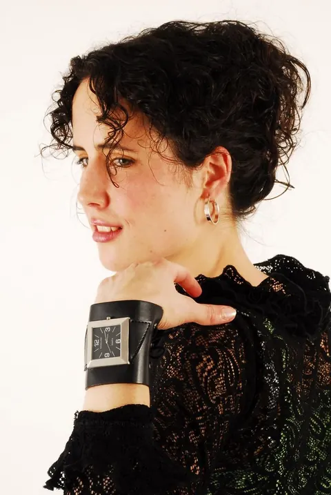Brunette Woman Poses with Hair Up Wearing a Watch – photo 15 of 16
