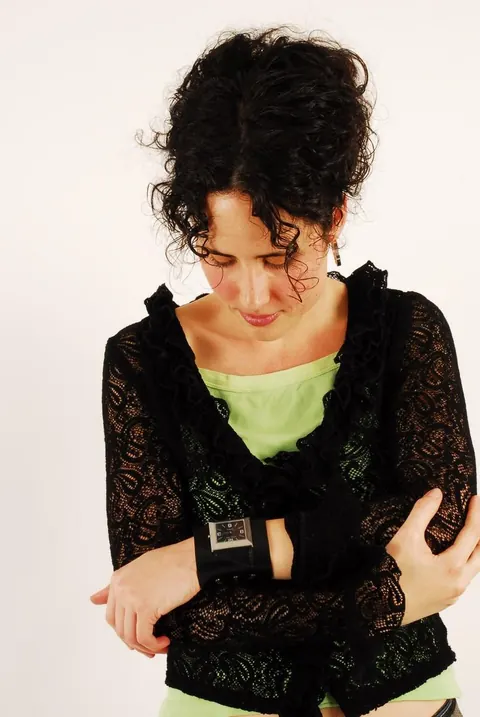 Brunette Woman Poses with Hair Up Wearing a Watch – photo 12 of 16