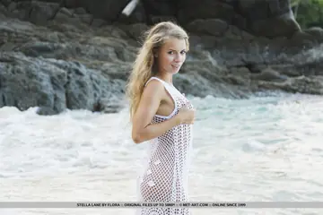 Slim European Blonde Bares Her Pussy on the Beach