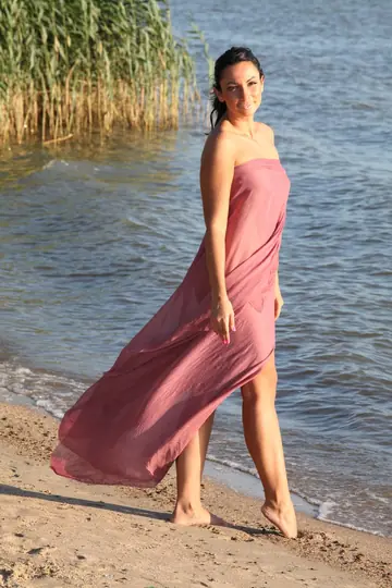 Woman Strips and Poses Front and Back for the Camera