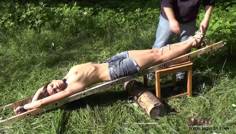 Busty Brunette in Shorts Gets Bound and Fucked in the Forest – photo 16 of 16