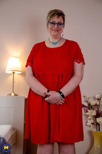 Mature Curvy Woman Drops Her Red Dress for Interracial Sex