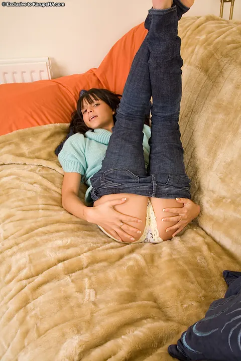 Petite Brunette Fingers Her Shaved Pussy After Sliding Down Her Jeans – photo 5 of 21
