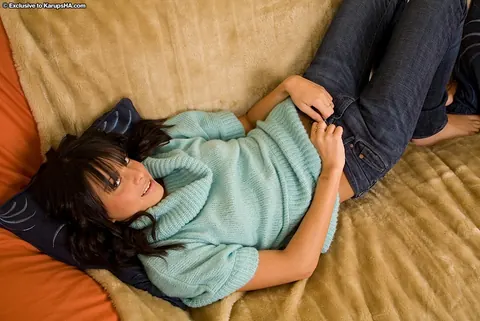 Petite Brunette Fingers Her Shaved Pussy After Sliding Down Her Jeans – photo 4 of 21