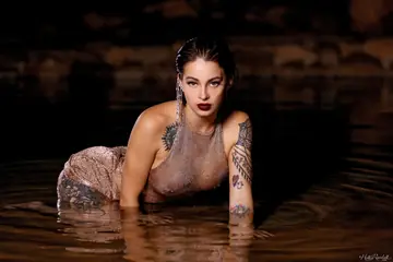 Busty Brunette in a Dress Flashes Her Tits and Spreads Her Legs