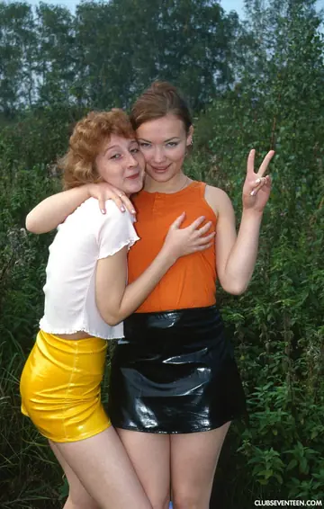 Hairy Redhead in Latex and Panties Kisses Lesbian Partner Outdoors