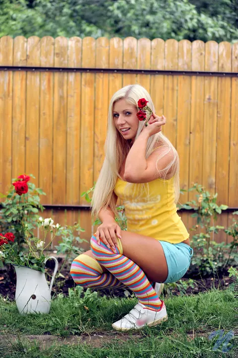 Candy Blond: Blonde in Striped Socks Fingers Her Shaved Pussy in the Yard – photo 3 of 14