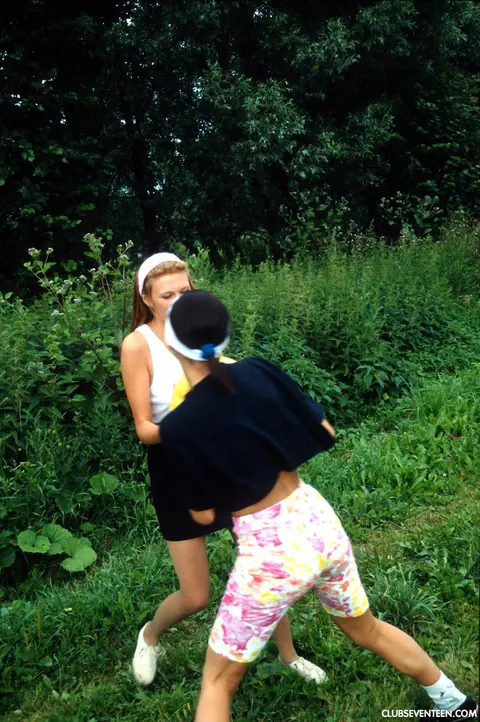 Marina I: Asian Brunette in a Skirt Fingers Lesbian Partner in Shorts Outdoors – photo 2 of 21