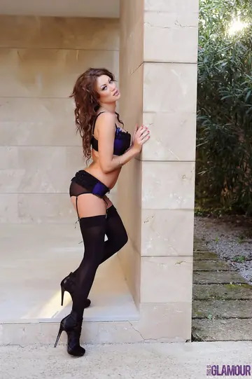 Slim European Brunette Poses in Lingerie and Stockings