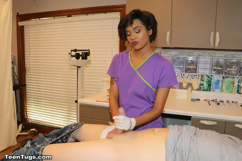 Tall Short-Haired Nurse Gives a Handjob in Latex – photo 12 of 21