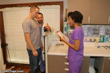 Tall Short-Haired Nurse Gives a Handjob in Latex