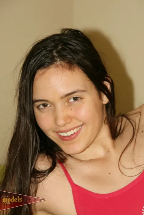 Allure Rose: Brunette Kicks Off Her Shorts and Spreads Her Pussy on the Bed – photo 2 of 16
