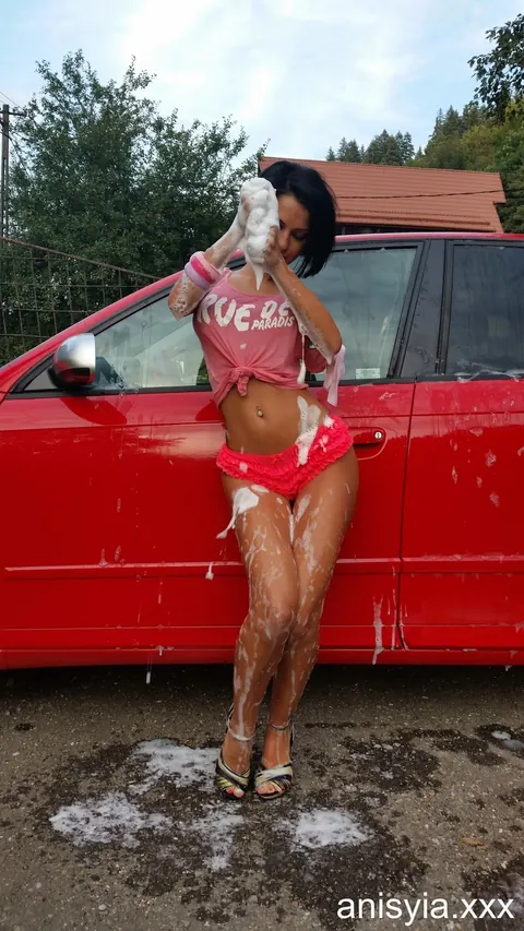 Anisyia XXX: Slim Brunette MILF in Heels and Panties Washes Car Outdoors – photo 7 of 17