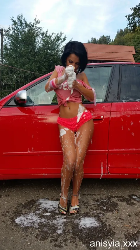 Anisyia XXX: Slim Brunette MILF in Heels and Panties Washes Car Outdoors – photo 8 of 17