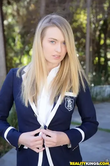 Busty Blonde in a Costume Strips and Spreads Outdoors
