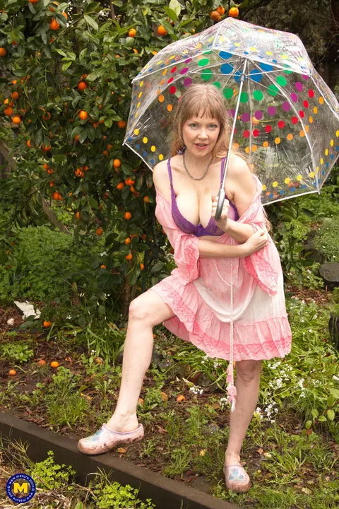 Lilli White: Mature Blonde Amateur Shows Cleavage and Flashes Her Ass Outdoors – photo 19 of 20