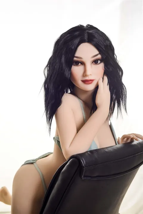 Black-Haired Woman Strips Out of Her Bikini on a Chair – photo 11 of 21
