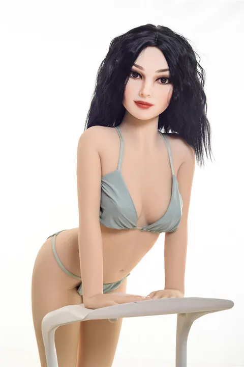Black-Haired Woman Strips Out of Her Bikini on a Chair – photo 3 of 21