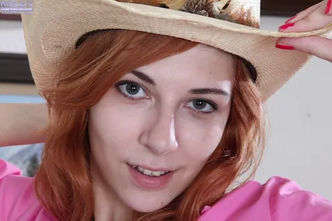 Nancy Reid: Redhead in Shorts Shows Off Her Big Natural Tits and Spreads Her Legs – photo 1 of 16